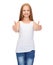 Girl in blank white shirt showing thumbs up