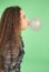 Girl blowing a bubblegum bubble