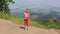 Girl blows bubbles on top of the Mount Tserkovka.