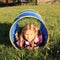 Girl in blue kids tunnel