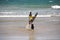 Girl with boogie board at beach