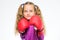 Girl boxer knows how defend herself. Girl child strong with boxing gloves posing on white background. She ready to