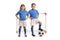 GIrl and boy in football kits posing with a ball in front of a goal