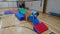 Girl and boy walking over an obstacle course
