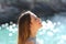 Girl breathing fresh air on a tropical beach on holidays