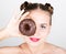 Girl in bright makeup eating a tasty donut with icing. Funny joyful woman with sweets, dessert. dieting concept. junk