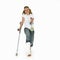 Girl with a broken leg walking on crutches