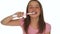 Girl Brushing Teeth Using Electric Toothbrush