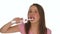 Girl Brushing Teeth Using Electric Toothbrush