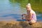 Girl builds a sand castle