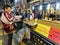 Girl buying sweet potato in Myeongdong open street market Seoul