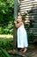 Girl on Cabin Porch