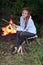 Girl at campfire