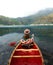 Girl canoeing on a lake