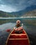 Girl canoeing on a lake