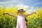 Girl in a canola field