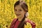 Girl in canola field