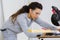 Girl carpenter using circular saw