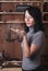 Girl-carpenter in the workshop,