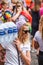 Girl carrying water. Gay pride at Copenhagen, year 2018.