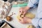 Girl carves cookies in the shape of a heart in the kitchen, at home, close-up. Handmade pastries with love for Valentine`s day,