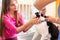 Girl with cat comforting her pet in vet clinic