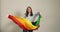 Girl celebrates with rainbow peace flag