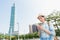 The girl checking her cellphone in Taipei 101.