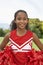 Girl Cheerleader On Soccer Field