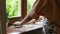 Girl chef kneads the dough for the pie