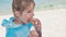 Girl Child Eating Beach Bread