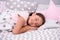Girl child fall asleep on pillow. Quality of sleep depends on many factors. Choose proper pillow to sleep well. Girl lay