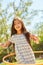 Girl in child gymnastics with hoops