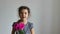 Girl child holding a bouquet of flower rose indoor