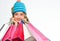 Girl child knitted hat hold bunch shopping bags. Fall sale season. Buy autumn clothes. Must have latest trends. Shopping