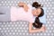 Girl child long hair fall asleep on pillow top view. Quality of sleep depends on many factors. Choose proper pillow to