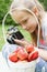 Girl child photographing old camera.