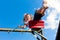 Girl child on swing in the garden