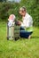 Girl and child in valise.family to journey