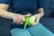 Girl cleans green Apple