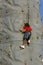 Girl Climbing Rock Wall