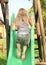 Girl climbing a slide