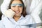 Girl in clinic smiles, individual oral hygiene.