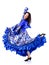 A girl in a colorful dress dances a gypsy dance.