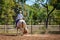 Girl Competing In Barrel Racing At Outback Country Rodeo