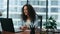 Girl conducting online interview at laptop in office closeup. Technology in work