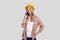 Girl Construction Worker Smilling Talking on Phone Watching Front Isolated. Girl Working. Modern Construction