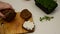 girl cooks and eats for breakfast open sandwich lettuce, tomato, soft cheese. Vegan sandwich with rye bread, spinach