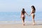 Girl Couple On Beach Summer Vacation, Young Woman Walking Holding Hands