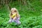 Girl with cowslip flower